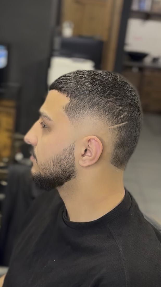 Precyzyjny fade i broda w Beirut Barber Shop.